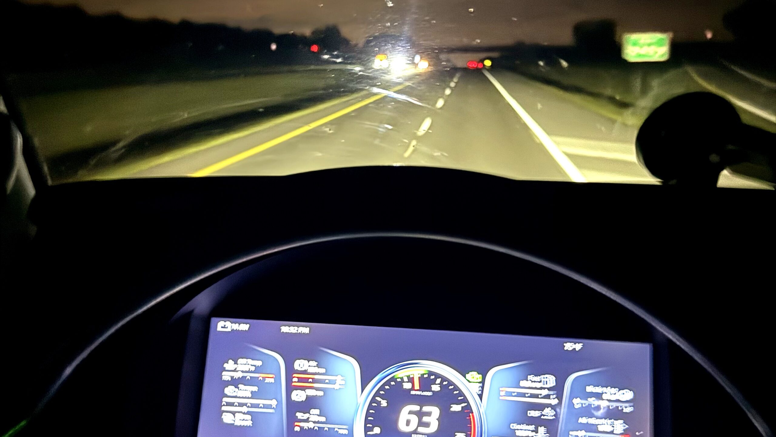 Highway at night, seen from the truck