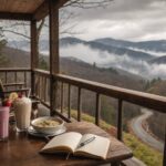 Smoothie, milkshake, and bowl of soup on a mountain cabin porch table overlooking the Smoky Mountains, representing the soft-food diet after an oral biopsy